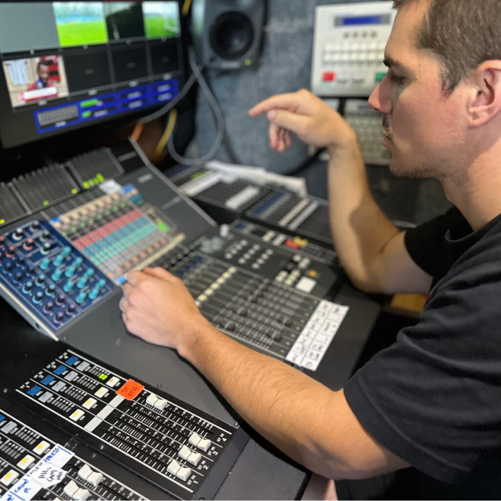 Arthur Fox in a broadcast truck